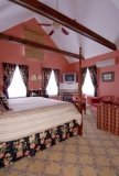 Room 209 - Spacious room with king size four poster bed with cathedral ceiling and corner fireplace.