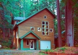 Mt. Baker Lodging - Cabin 51 - This beautiful 3-story, 3-bedroom, 2-bath executive vacation home includes wonderful natural lighting! The 1st floor is an adhoc game room that includes , 1-set of bunk beds, and a separate laundry room with a full size washer/dryer. The main floor features a great open living/dining area with hardwood floors, a vaulted ceiling, and a freestanding gas fireplace. A separate fully equipped kitchen i