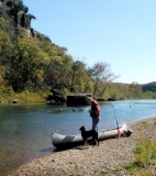 Canoeing at the river beneath the bluff