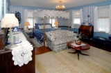 Suite 4 - Second floor corner suite, gas fireplace, sitting area, jacuzzi tub and separate shower in attached private bathroom