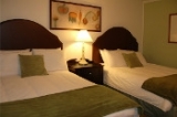 Rooms - Recently remodeled rooms provide triple-sheeted beds, soft and firm pillows, down-like comforters, iPod/MP3 players, flat screen TV's, robes, DVD/CD players, linen spray and spa quality toiletries.